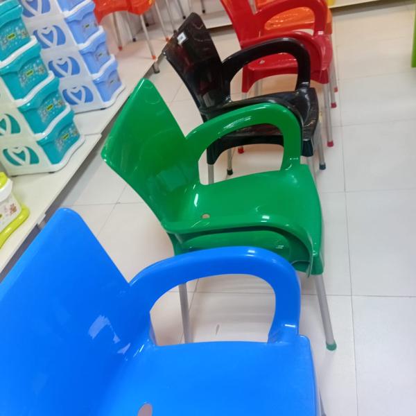 Plastic chair with iron leg